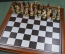 Шахматы подарочные, новые "The chessmen".  Полистоун, дерево. Китай. 2001 год.