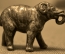 Старинная миниатюрная металлическая статуэтка "Слон".