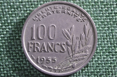 Монета 100 франков 1955 года, Франция.